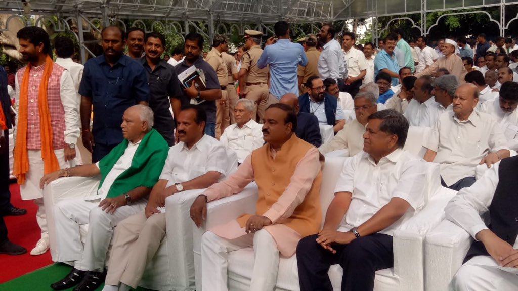 CM Yeddyurappa sitting with other MLAs