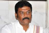 Karnataka Congress brawl Anand Singh wife Laxmi threatens legal action MLA Ganesh