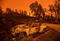 California wildfire destroys 500 structures, nearly levels community