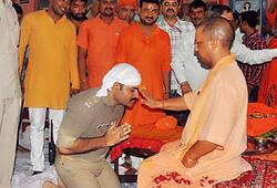 Policeman in uniform kneels before Adityanath to seek blessings, photos go viral