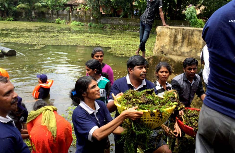 Kerala rescue team IAS officer raja manickam take rice bags