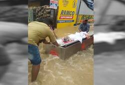 Kerala floods man body boat final rites