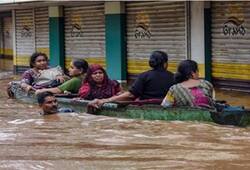 Kerala floods people stranded await rescue roads damaged