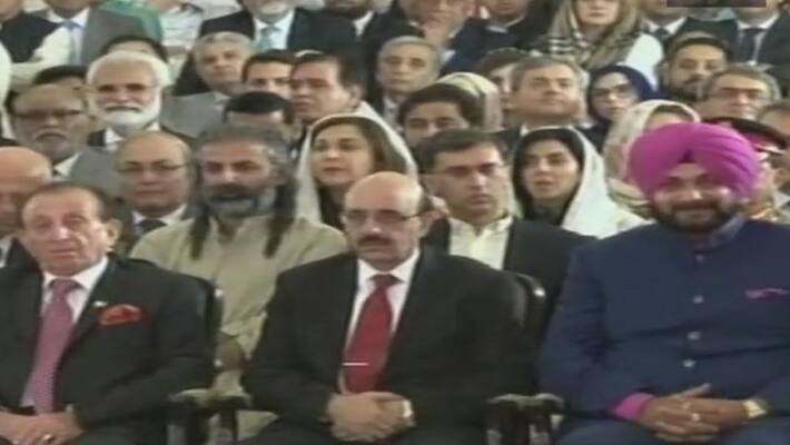 Twitter fumes! Sidhu hugs Pak army chief, sits next to Pok head at Imran oath-taking Twitter fumes! Sidhu hugs Pak army chief, sits next to Pok head at Imran oath-taking