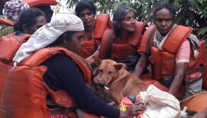 Kerala floods woman refuses rescue without her pet dogs in thrissur