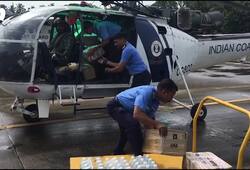 Kerala Floods 2018 India helicopter water food Army remote area relief