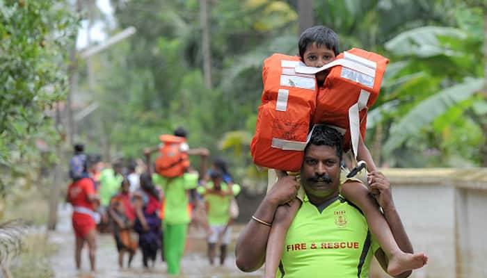 Kerala Floods rescue  operation torrential rains deluge Eid al-Adha Pinarayi Vijayan