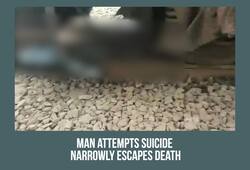 Karnataka Man attempts suicide railway engine escapes death Video