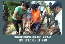 Karnataka Woman railway line loses her left arm Video injuries stray dogs