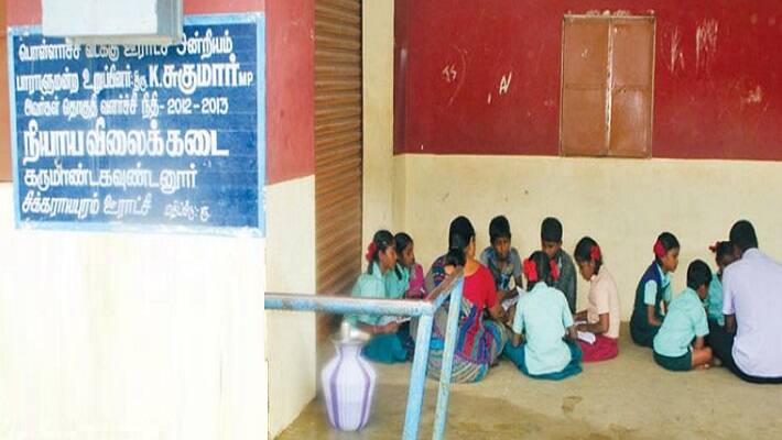 Class taken for government school students in ration shop building