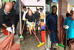 Kerala ministers hands feet dirty cleaning flood ravages Video