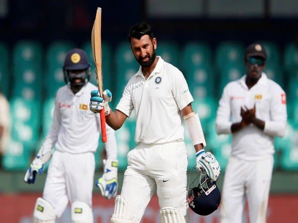 cricket player pujara got century