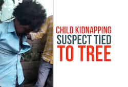 Karnataka Child kidnapping suspect tied to tree thrashed by mob Video Odisha