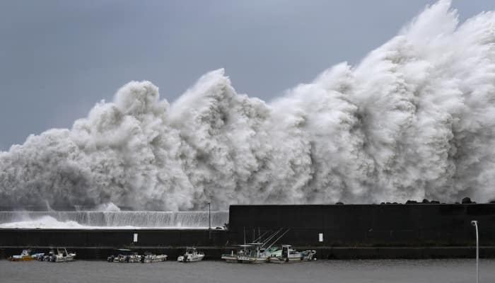 Japan Tokyo flood landslide typhoon jebi heat osaka hokkaido earthquake