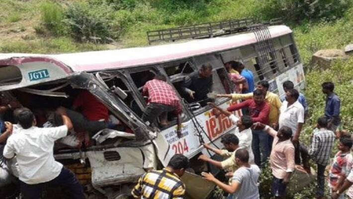 Jangaon road accident... lorry collides with RTC bus at hyderabad warangal highway Jangaon road accident... lorry collides with RTC bus at hyderabad warangal highway