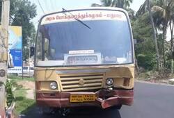 Tamil Nadu 3 men on bike survive after bus bumps over Madurai Video