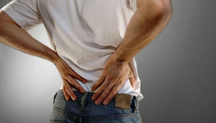 how to reduce back pain by using the wheel