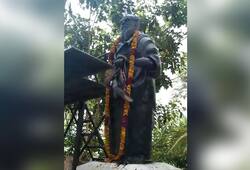 Tamil Nadu Dravida Kazhagam workers protest place slipper garland Periyar's statue
