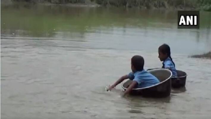 Video Kids Cross River In Aluminium Pots To Reach School In Assam Video Kids Cross River In Aluminium Pots To Reach School In Assam