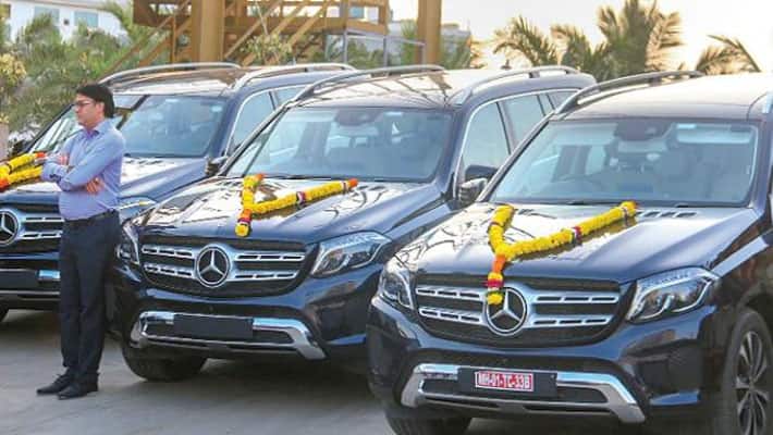 employees Mercedes-Benz car...Surat diamond trader gifts