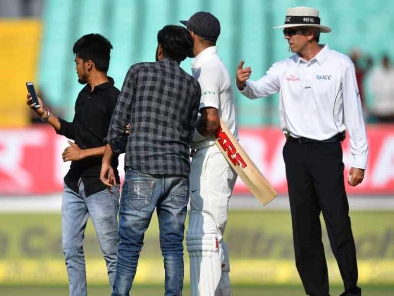 India vs West Indies Pitch Invaders Take Selfie With Virat Kohli