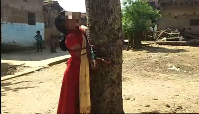 Women Tied To Tree Thrashed By Villagers Women Tied To Tree Thrashed By Villagers