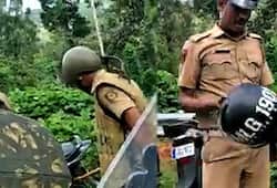 Sabarimala row Kerala Police vandalise parked motorcycles steal helmets