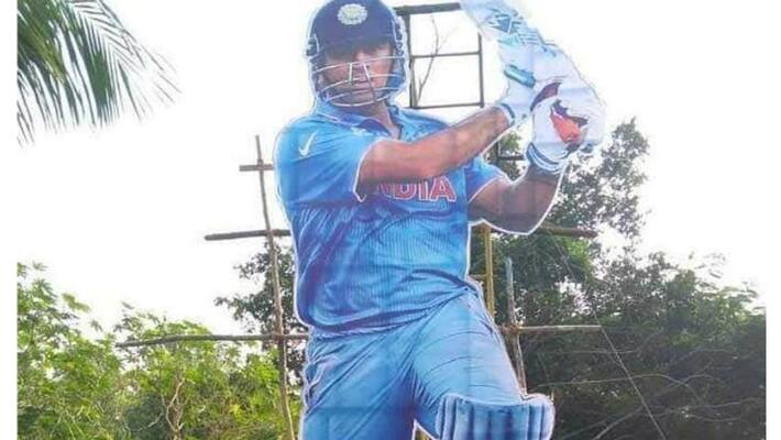 fans pay tribute to dhoni with big cut out in trivandrum fans pay tribute to dhoni with big cut out in trivandrum