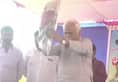 Revenue minister RV Deshpande throw away sports kits at young talent