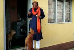 Karnataka by-election Mandya BJP candidate Dr Siddaramaiah feeds dogs vote Video