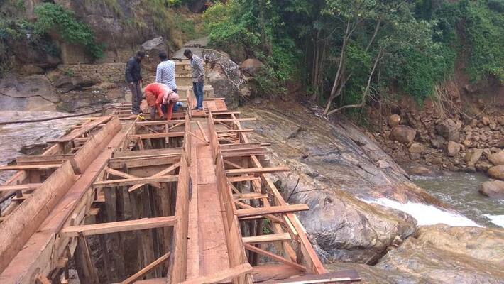new bridge construction in aatukattu waterfalls new bridge construction in aatukattu waterfalls