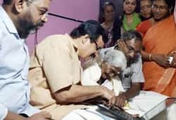 Karthyayani Amma tops exams Kerala minister C Raveendranath laptop