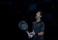 Novak Djokovic cruises past John Isner in ATP Finals opener