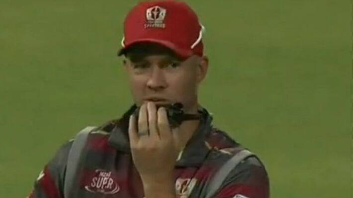 de villiers speaks in walkie talkie with coach during mzansi super league match de villiers speaks in walkie talkie with coach during mzansi super league match