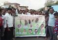 Farmers protest Karnataka government garland banner slippers