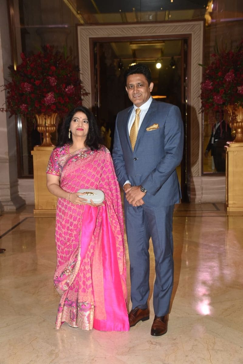 Ex cricketer Anil Kumble arrived for the reception with his wife Chethana. He wore a suit while she wore a pink saree and carried a Sabyasachi clutch.