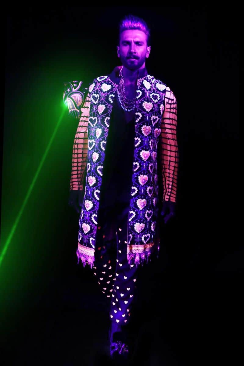Manish Arora designed an anti-fit, long silk jacket with handcrafted embellishments and his trademark heart motifs.