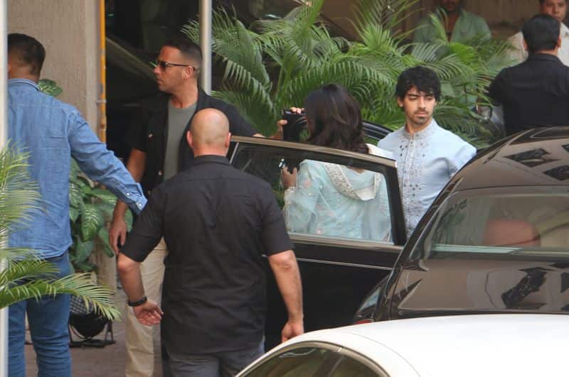 Groom-to-be Nick Jonas's brother, singer Joe Jonas spotted arriving at Priyanka Chopra's residence for puja ceremony.
