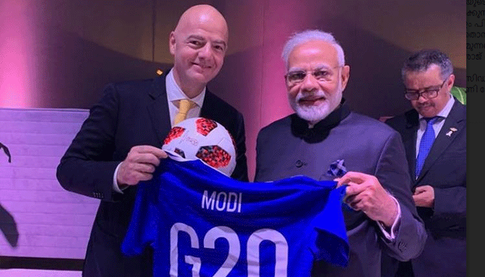 PM Modi receives special football jersey from FIFA President PM Modi receives special football jersey from FIFA President