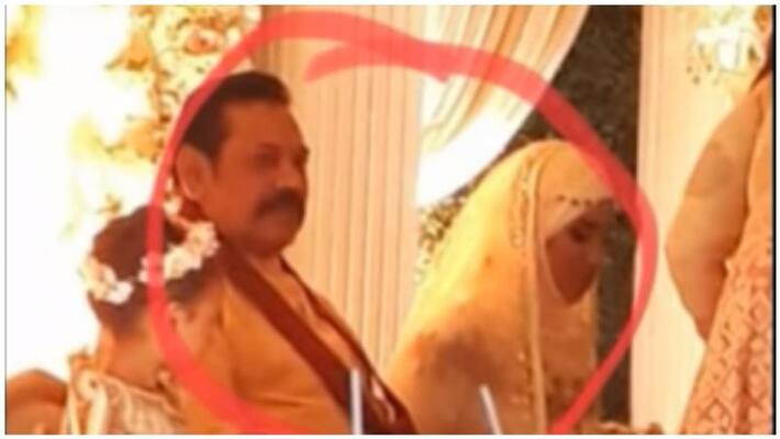 rajapakshe's marrige stills wth a islam girl rajapakshe's marrige stills wth a islam girl