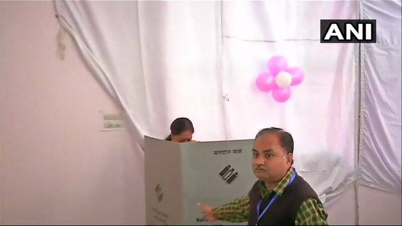Rajasthan chief minister Vasundhara Raje casts her vote at polling booth no. 31A in Jhalrapatan constituency of Jhalawar. Voting has begun in Telangana and Rajasthan for 119 and 199 Assembly constituencies respectively amid tight security on Friday.