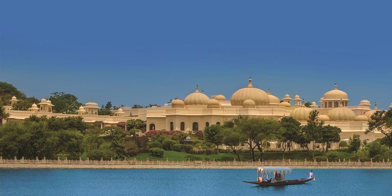 Located on the bank of Lake Pichola, all accommodation and dining spaces offer views across the hotel's gardens and sparkling lake.