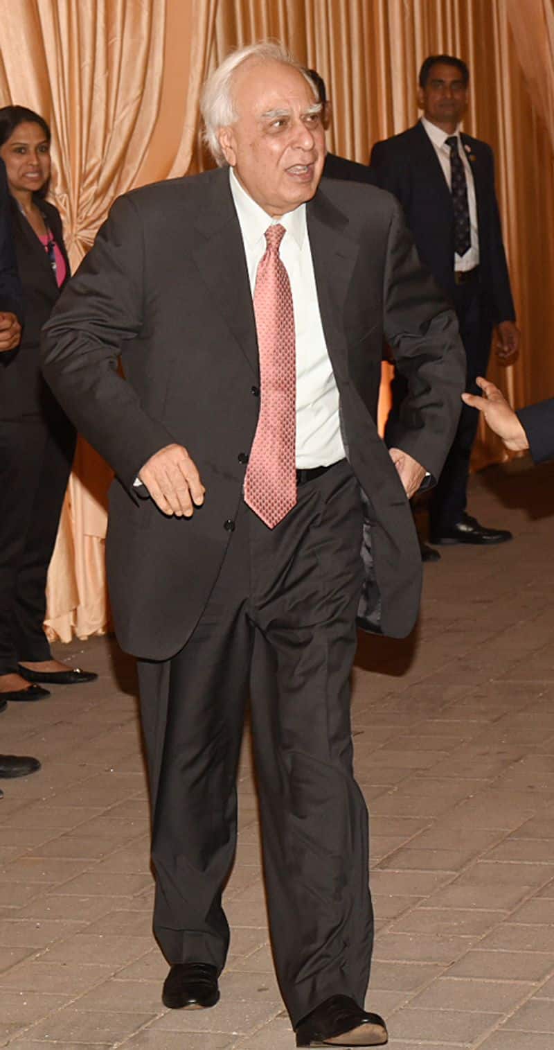 Politician Kapil Sibal spotted walking briskly towards the wedding festivities at Jio Gardens in Mumbai.
