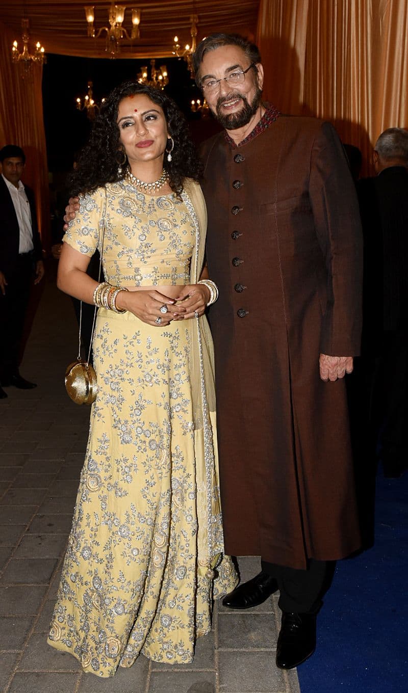 Kabir Bedi arrives at the wedding reception with his wife, Parveen Dusanj.