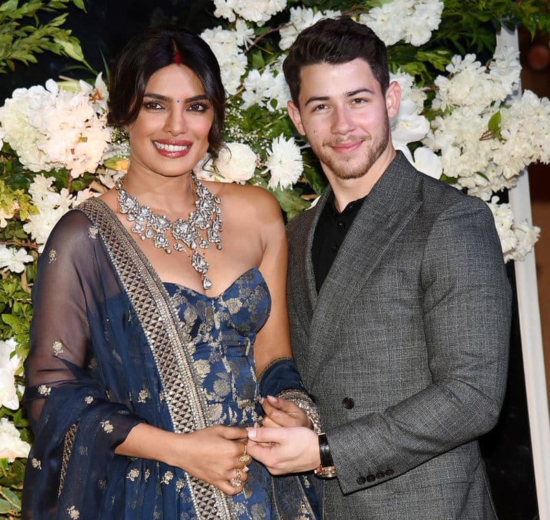 Priyanka Chopra's gorgeous and huge diamond necklace grabbed more eyeballs than her arm candy, husband Nick Jonas.