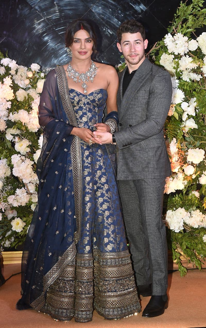 Priyanka Chopra'srocked a Sabyasachi Mukherjee creation yet again to host their second wedding reception.