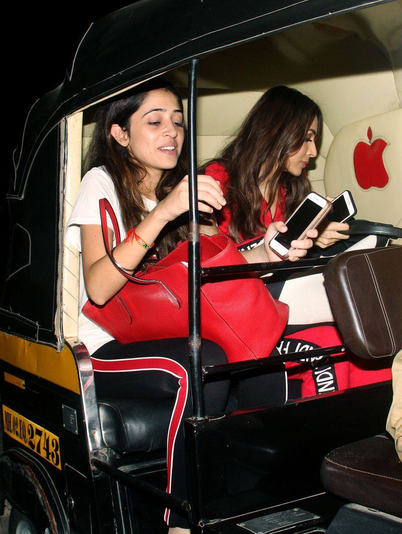 Malaika Arora was spotted taking an auto rickshaw ride with a friend in Mumbai.