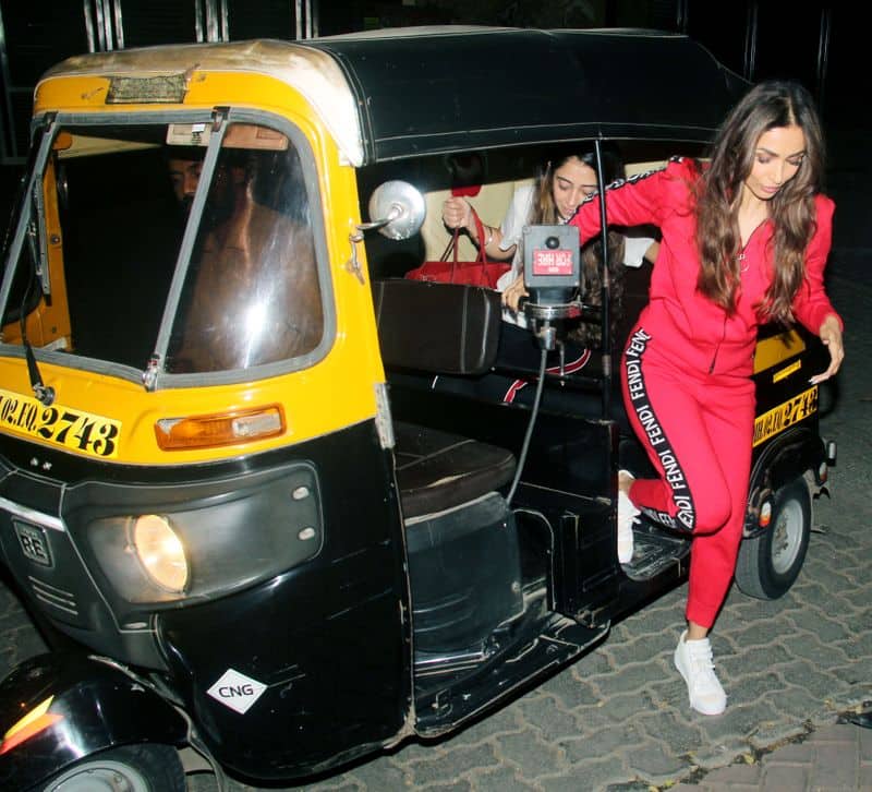 The auto ride did not seem to cramp Malaika's style as she stepped out with immaculately blow-dried hair.
