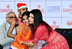 Aishwarya Rai Bachchan plays Santa Claus in red lehenga for cancer survivors