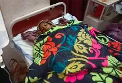 Beaten woman in Madhya Pradesh